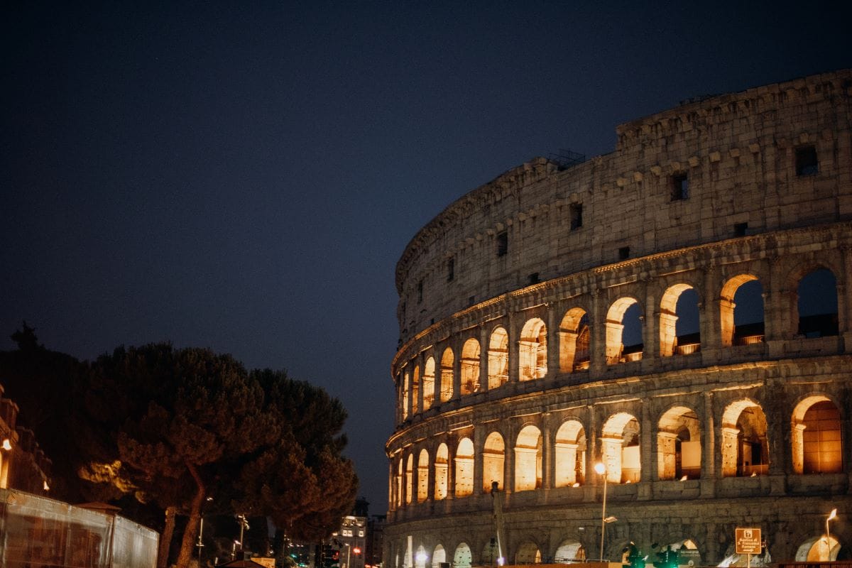 ancient round building illuminated from within