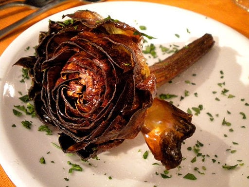 carciof alla guidea, or deep fried artichoke, is one of the Rome's most beloved Jewish foods. Find out the rest in our blog!