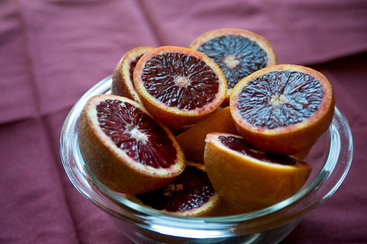 glass bowl of blood oranges