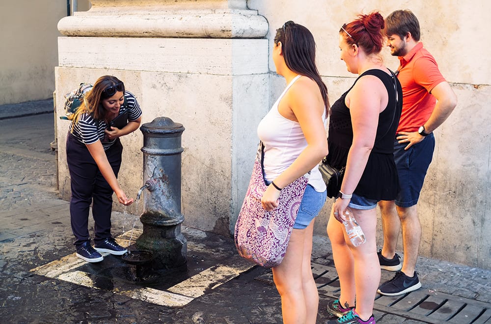 woman at water fountain