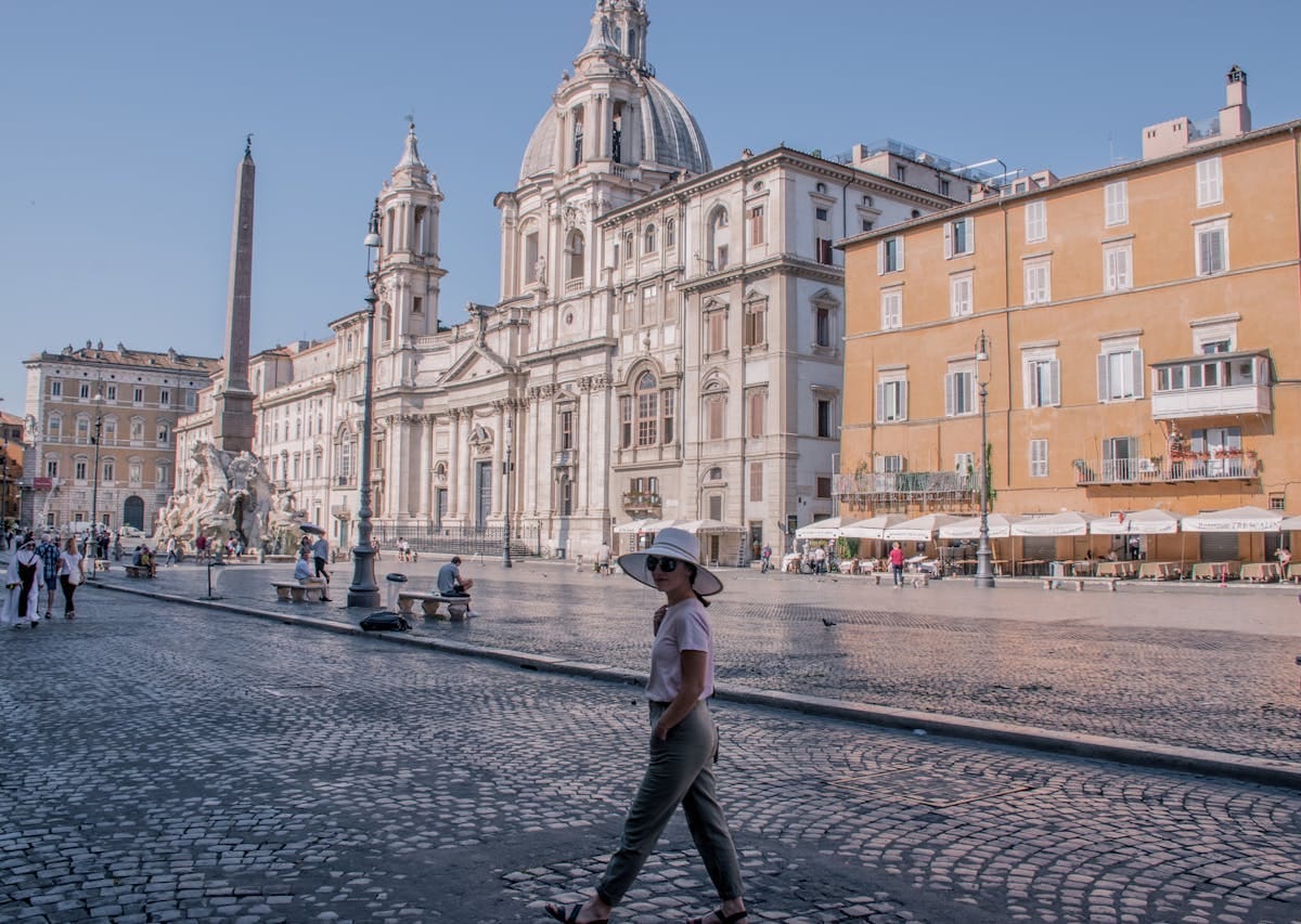 Person walking around Piazza Navona