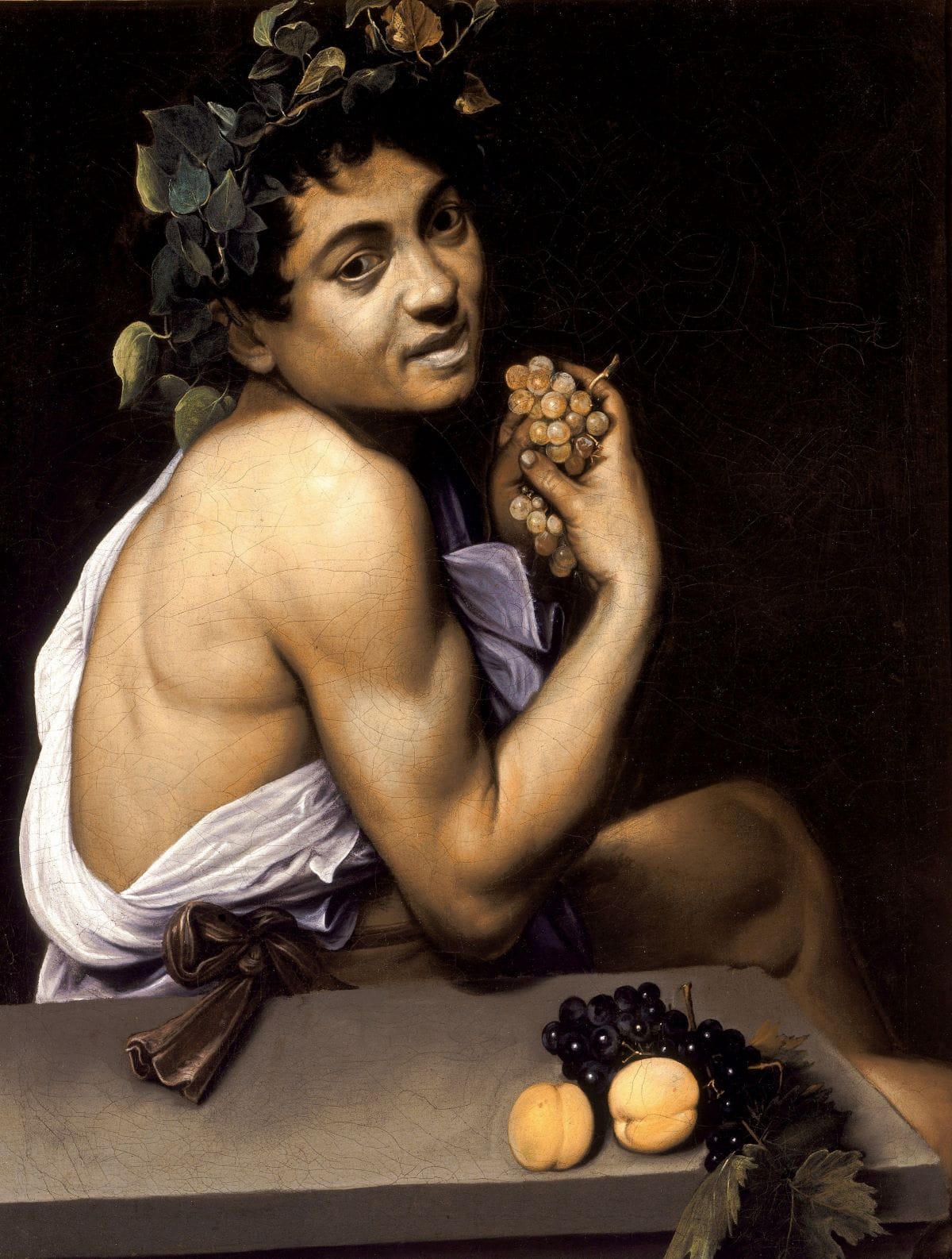 painting of boy holding grapes in his hand