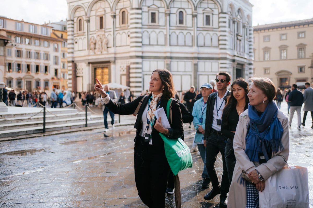 A group of people walking around Florence, Italy.