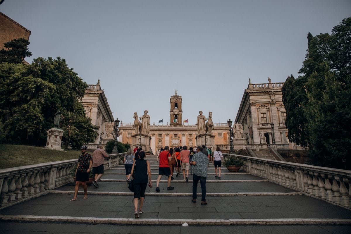 People walking up the Spanish Steps in Rome at night. 