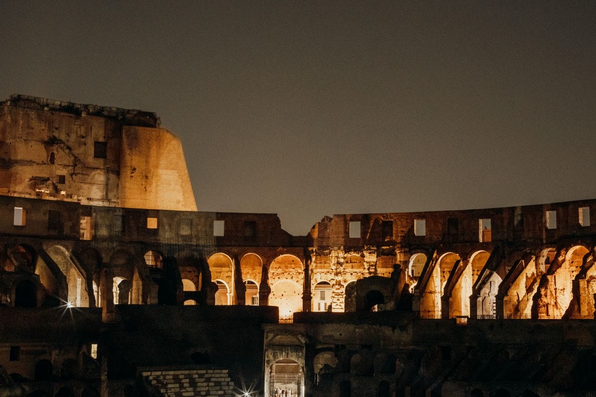 The Colosseum at night in Rome illuminated. 