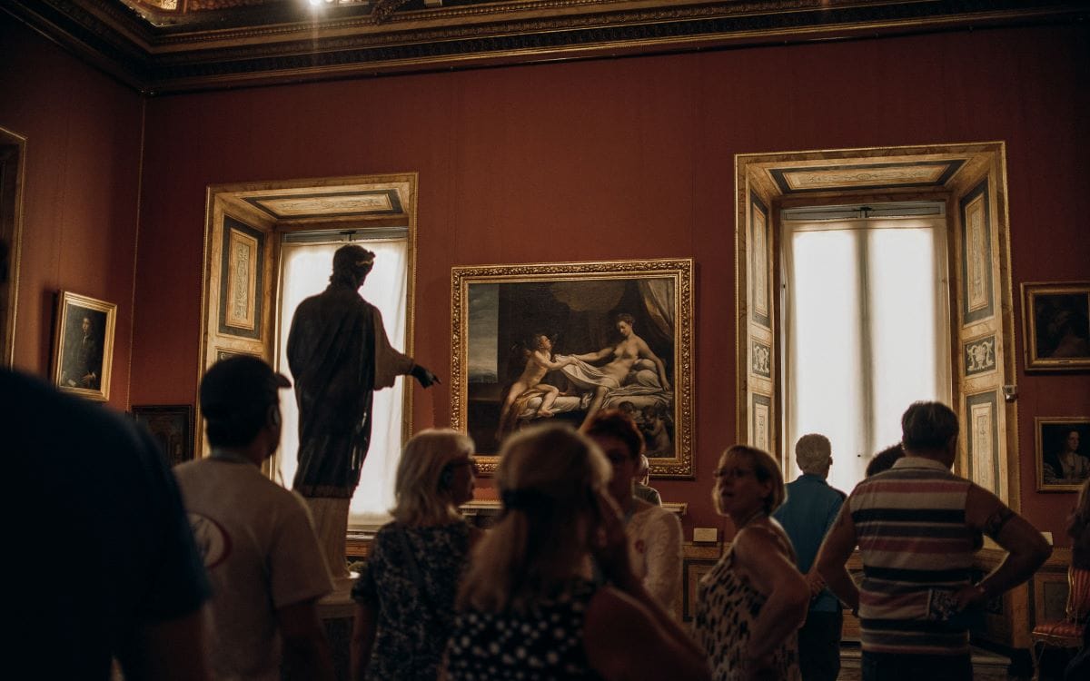 a group of people in a museum